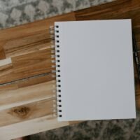 Notebook on a desk for planning ideas from content marketing examples