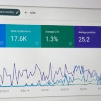 AI search monitoring tools dashboard on a desktop monitor