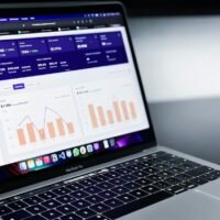 Ahrefs vs Moz comparison of SEO performance analytics on screen