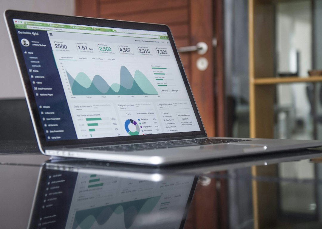 Ahrefs alternatives compared on a laptop showing SEO traffic charts