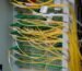 IT outsourcing - fibre optic cables in a managed server rack
