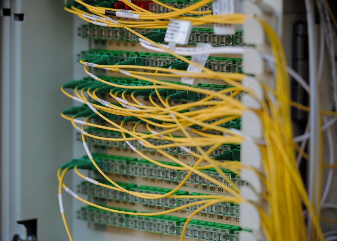 IT outsourcing - fibre optic cables in a managed server rack